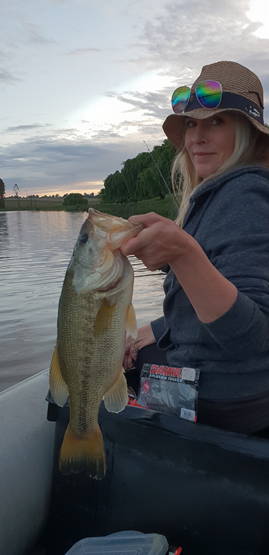 Bass fishing from the boat at sunset, Willow Tree Cottage