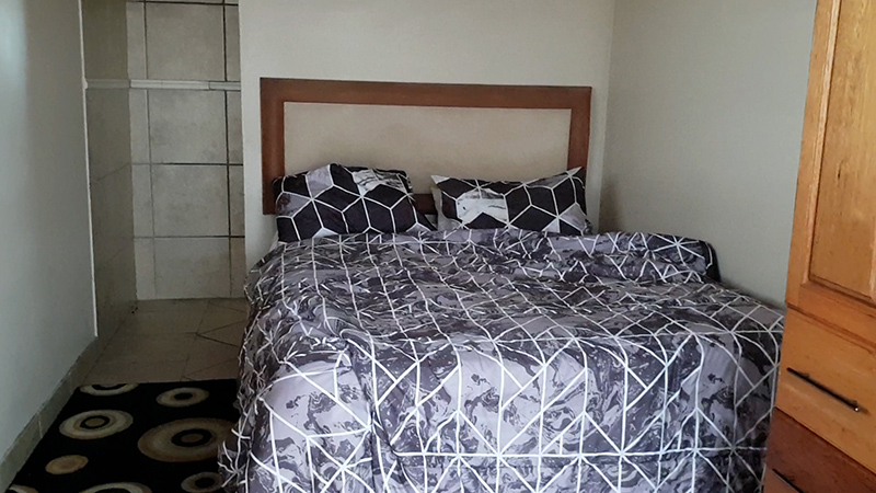 A bedroom at the jetty chalet, Aqua Villa