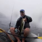 Little Scotland big bass fish caught from boat in mist