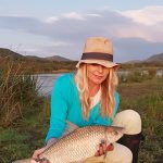 Girl with rednose mudfish caught at Loskop dam