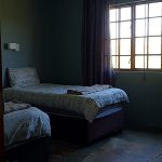 Bedroom in cottage at Fountain Hall guest farm on Mearns Dam