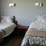 Bedroom in cottage at Fountain Hall guest farm on Mearns Dam