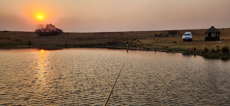 Sunset while fishing in farm dam near Olifants River