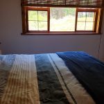 Bedroom in cabin at Stanford Lake Lodge