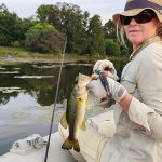 Small bass caught at Stanford Lake Lodge in the lily pads